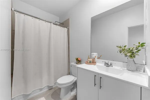 a view of washer and dryer in a utility room