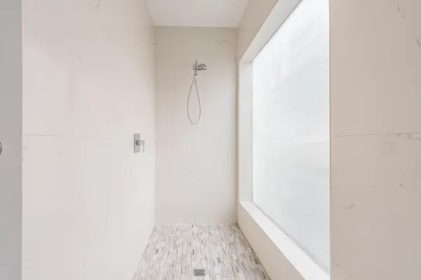 a view of bathroom with shower