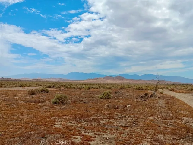 a view of an ocean and mountain