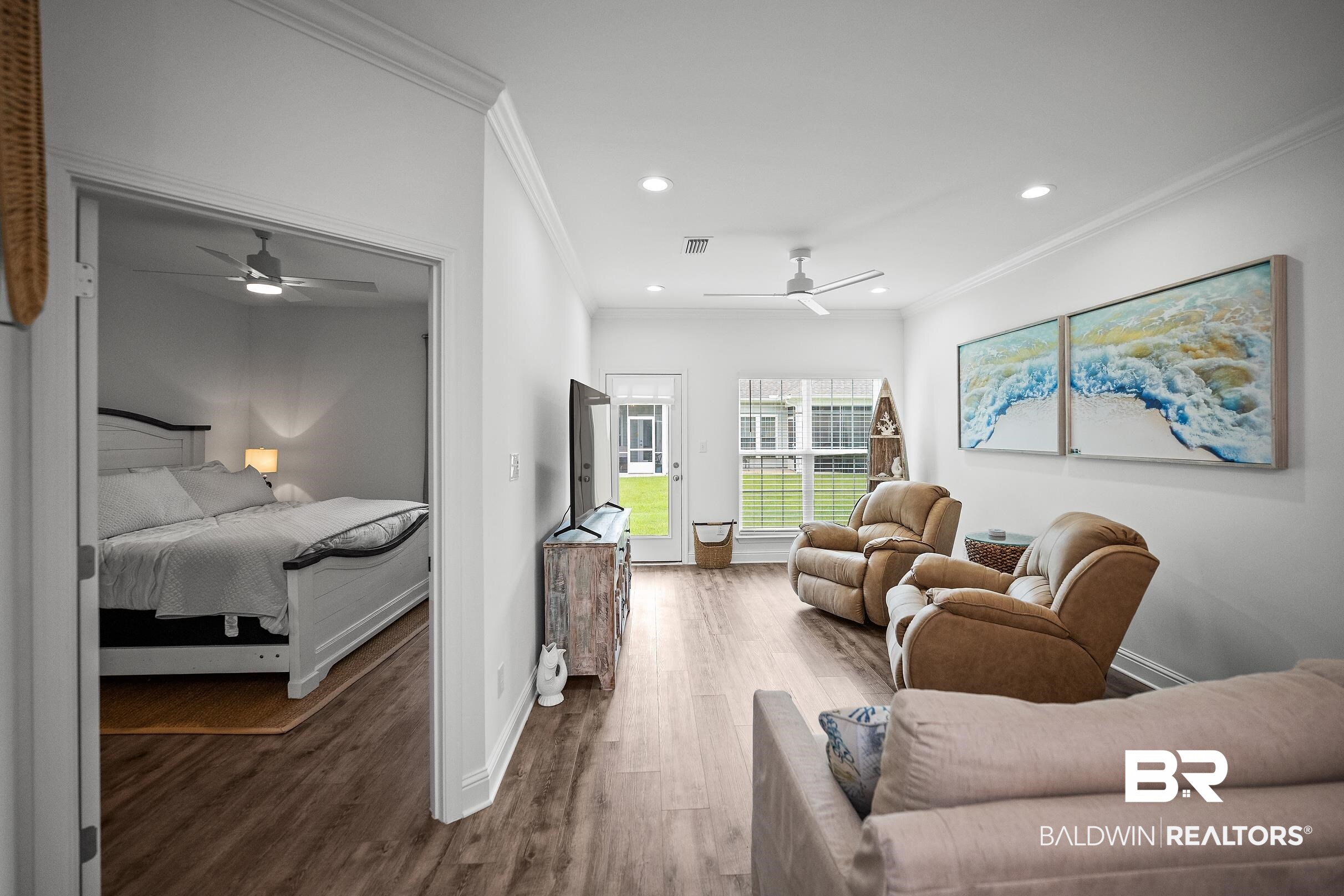 2651 South Juniper Street, Unit 2002 Foley, AL 36535 - Photo 9 of 23 Open-concept living area featuring wood-finish flooring, recessed lighting, and a ceiling fan