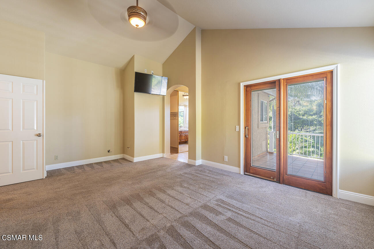 415 Fresh Meadows Road Simi Valley, CA 93065 - Photo 17 of 49 a view of an empty room with glass door