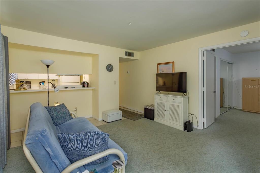 240 Orienta Point Street, Unit 240 Altamonte Springs, FL 32701 - Photo 6 of 20 a living room with furniture and a flat screen tv