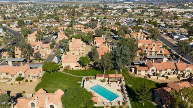 an aerial view of a city with lots of residential buildings