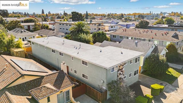 an aerial view of a city with lots of residential buildings