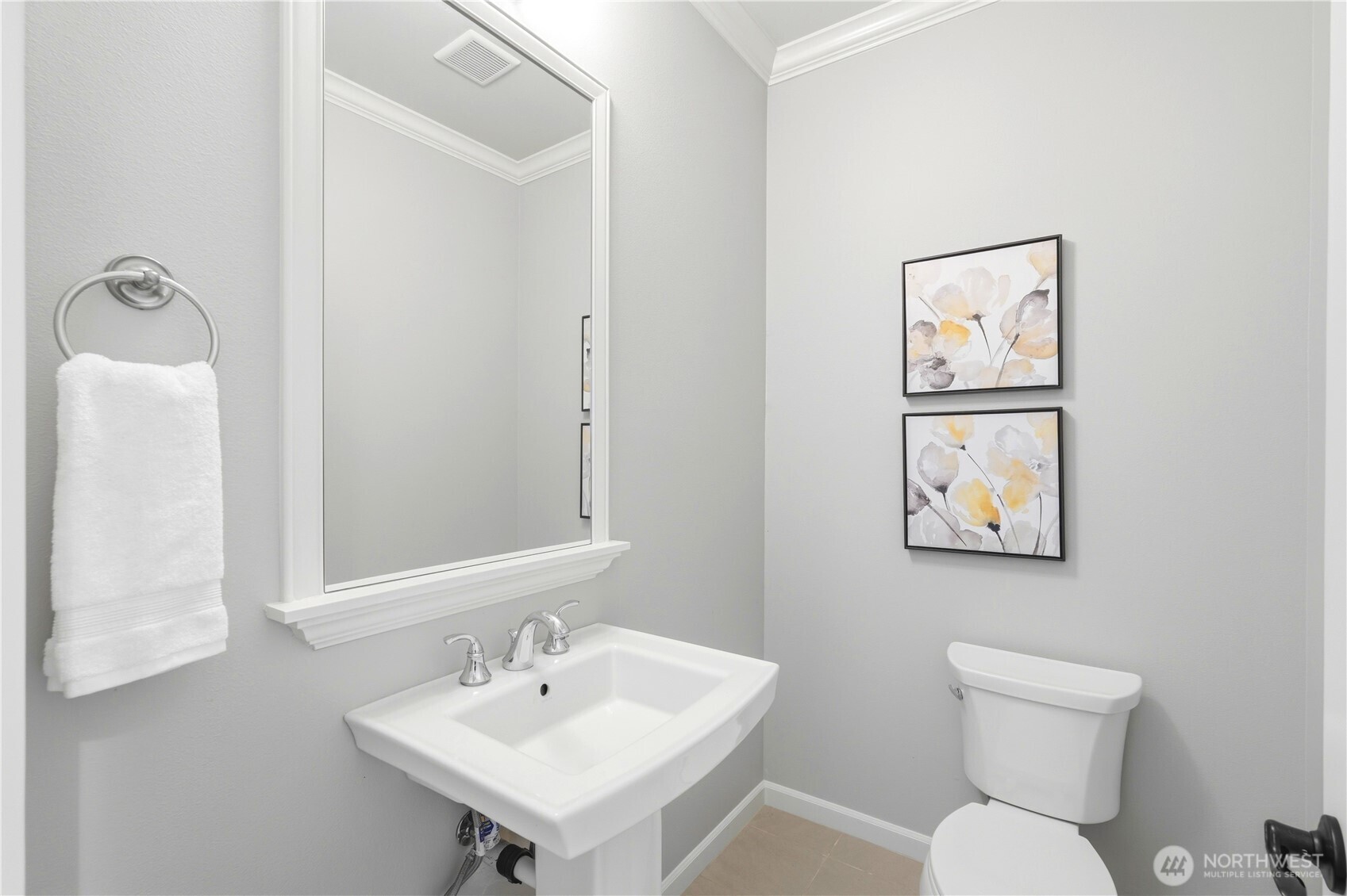 4413 185th Place Southeast Bothell, WA 98012 - Photo 17 of 40 a bathroom with a toilet a sink and mirror