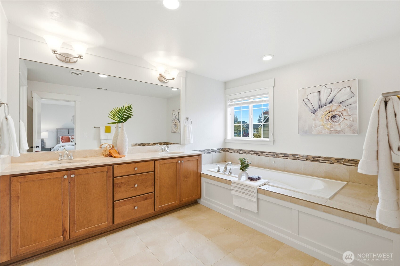 4413 185th Place Southeast Bothell, WA 98012 - Photo 21 of 40 a spacious bathroom with a tub a sink and mirror