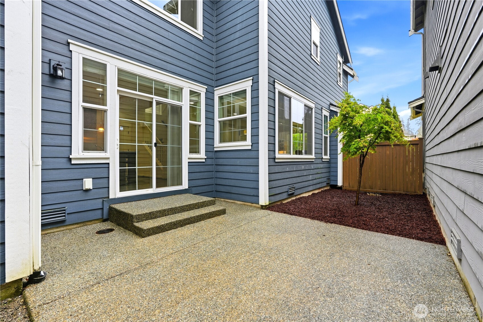 4413 185th Place Southeast Bothell, WA 98012 - Photo 30 of 40 a front view of a house with a yard