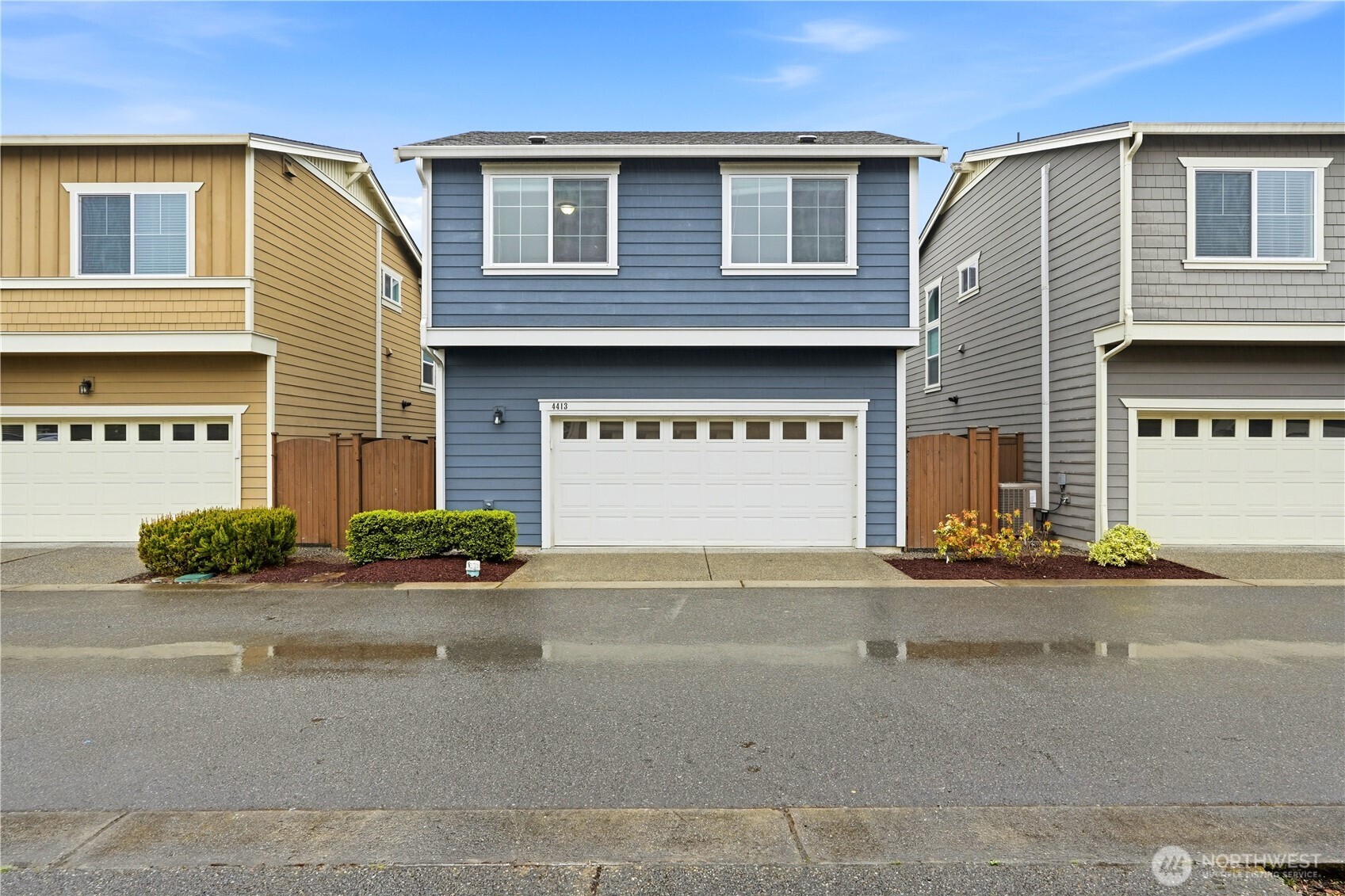 4413 185th Place Southeast Bothell, WA 98012 - Photo 33 of 40 a front view of a house with street