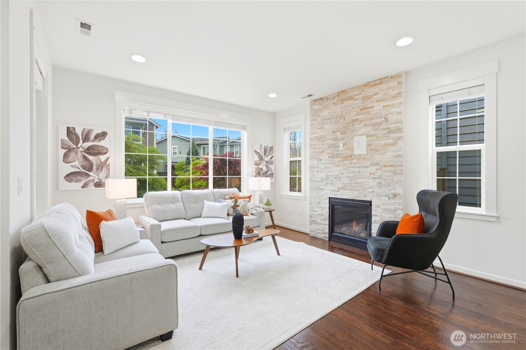 4413 185th Place Southeast Bothell, WA 98012 - Photo 5 of 40 a living room with furniture and a fireplace