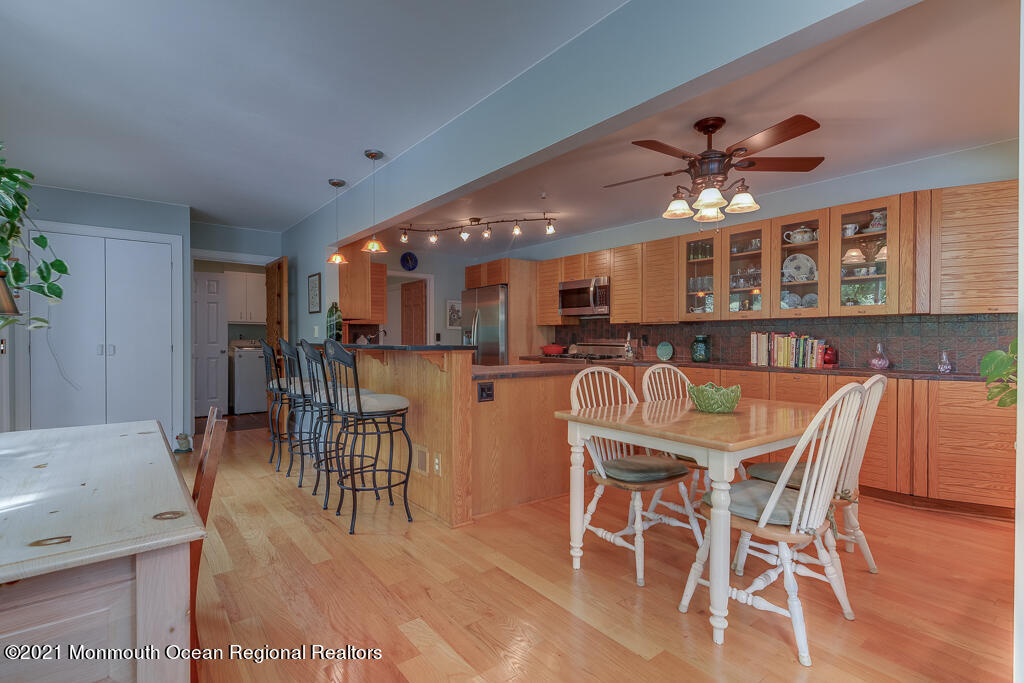 2 Flora Drive Holmdel, NJ 07733 - Photo 15 of 34 a dining room with furniture and window