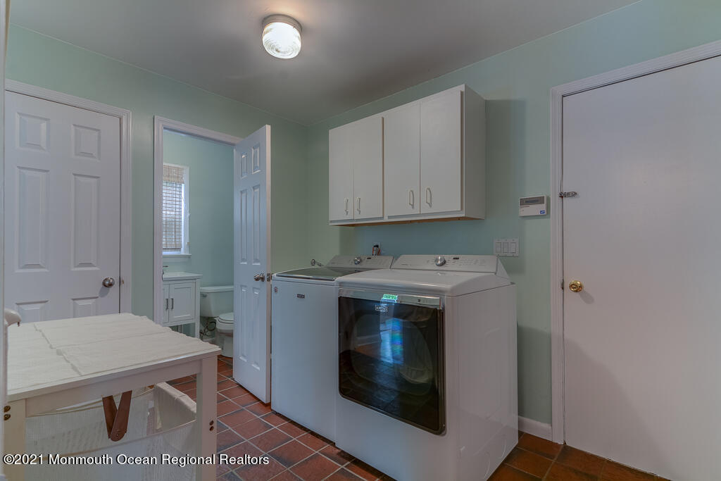 2 Flora Drive Holmdel, NJ 07733 - Photo 34 of 34 a view of a kitchen with sink and cabinets