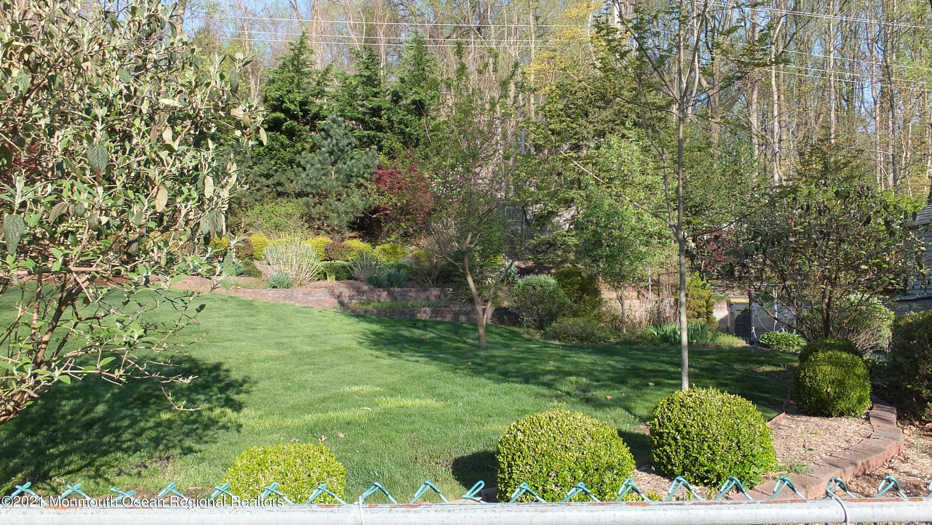 2 Flora Drive Holmdel, NJ 07733 - Photo 5 of 34 a view of a garden