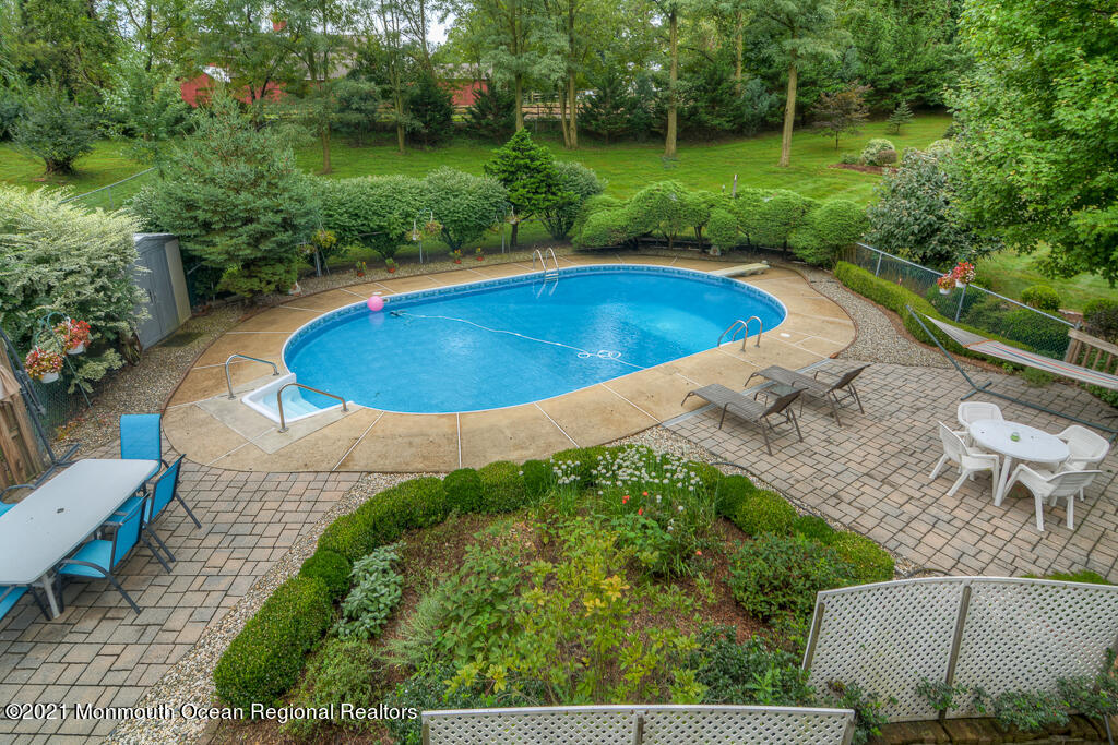 2 Flora Drive Holmdel, NJ 07733 - Photo 8 of 34 an aerial view of a house having swimming pool