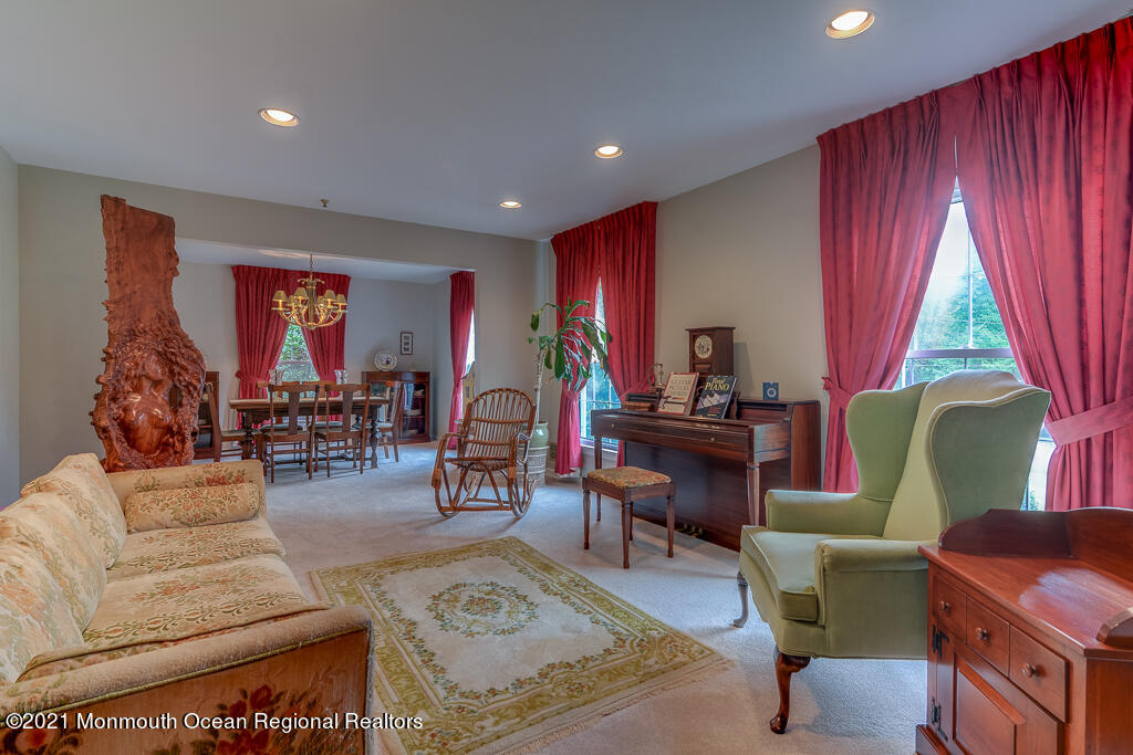 2 Flora Drive Holmdel, NJ 07733 - Photo 10 of 34 a living room with furniture and a large window