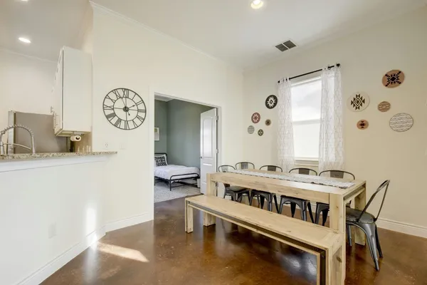 a living room with furniture and a table