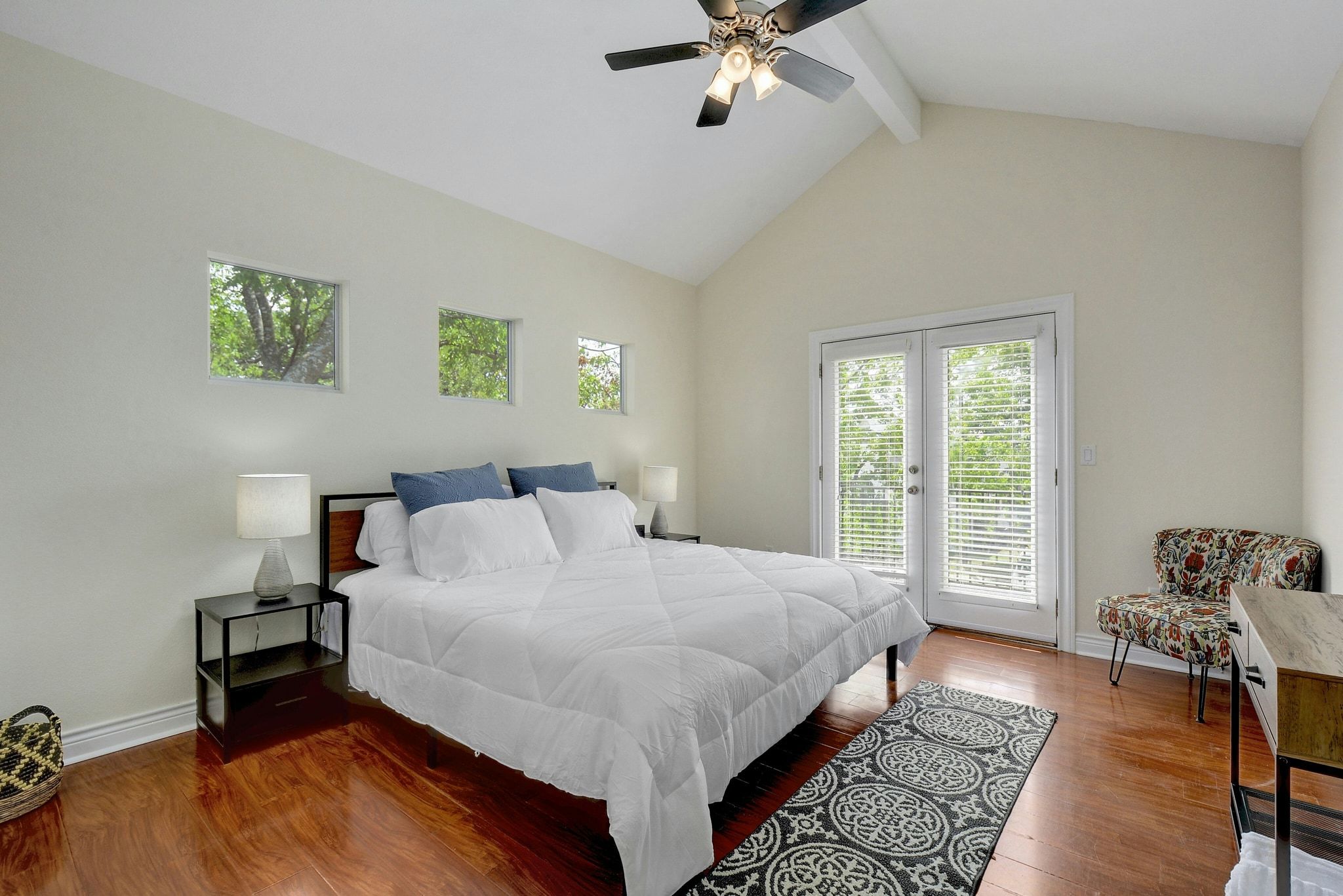 2206 East 14th Street, Unit 2 Austin, TX 78702 - Photo 17 of 31 Spacious primary retreat with vaulted ceilings and a grand feel.