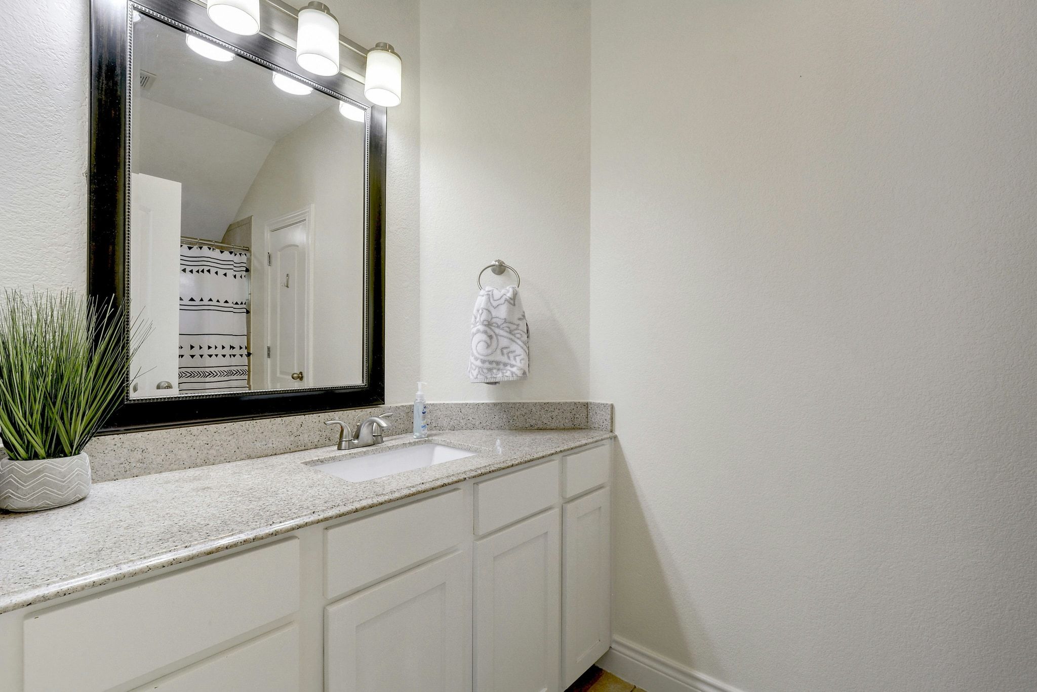 2206 East 14th Street, Unit 2 Austin, TX 78702 - Photo 21 of 31 Private en-suite bath designed for everyday comfort.