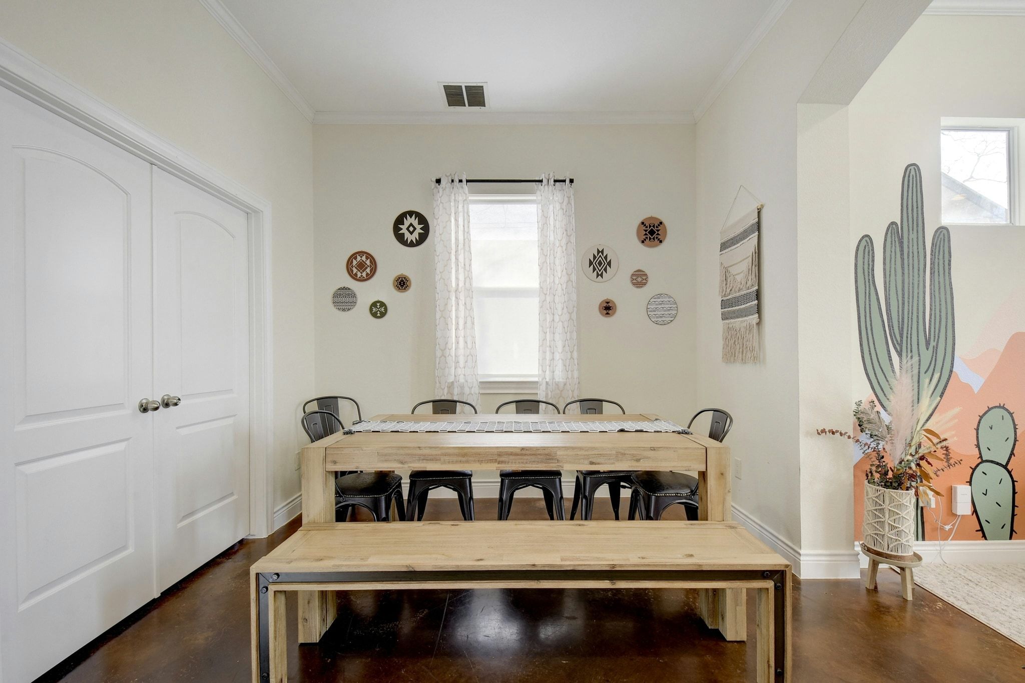 2206 East 14th Street, Unit 2 Austin, TX 78702 - Photo 3 of 32 Sun-filled dining space seamlessly connected to the kitchen and living room.