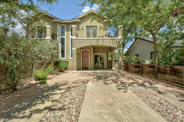 a view of house with yard