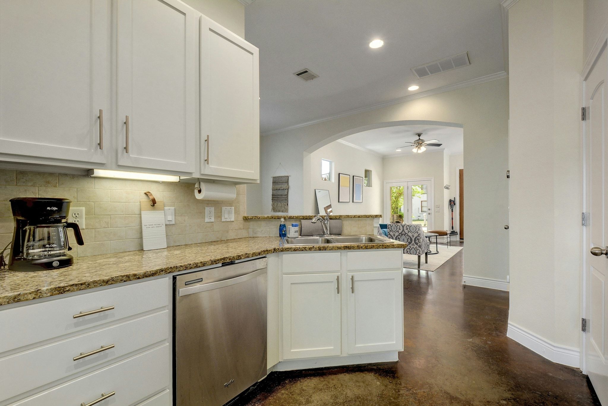 2206 East 14th Street, Unit 2 Austin, TX 78702 - Photo 10 of 31 Granite countertops provide beauty and durability for cooking and gathering.