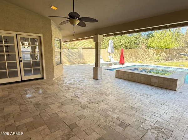 a view of a swimming pool with an outdoor space