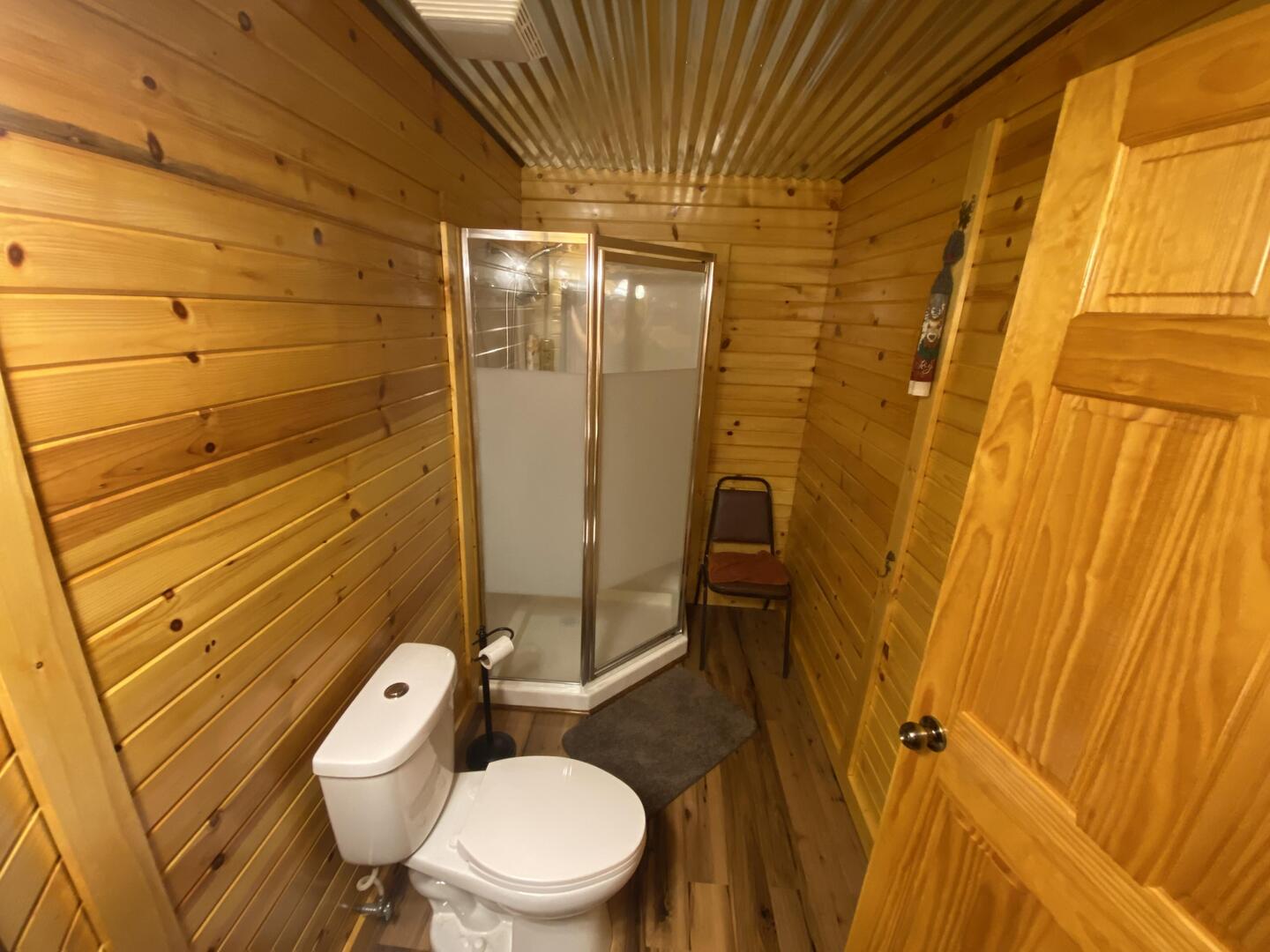 7330 North Crestview Road Stillman Valley, IL 61084 - Photo 28 of 33 a bathroom with a toilet and shower