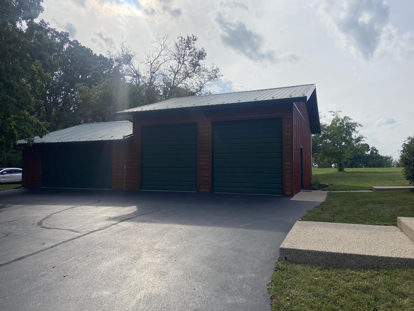 7330 North Crestview Road Stillman Valley, IL 61084 - Photo 3 of 33 a house view with a garden space
