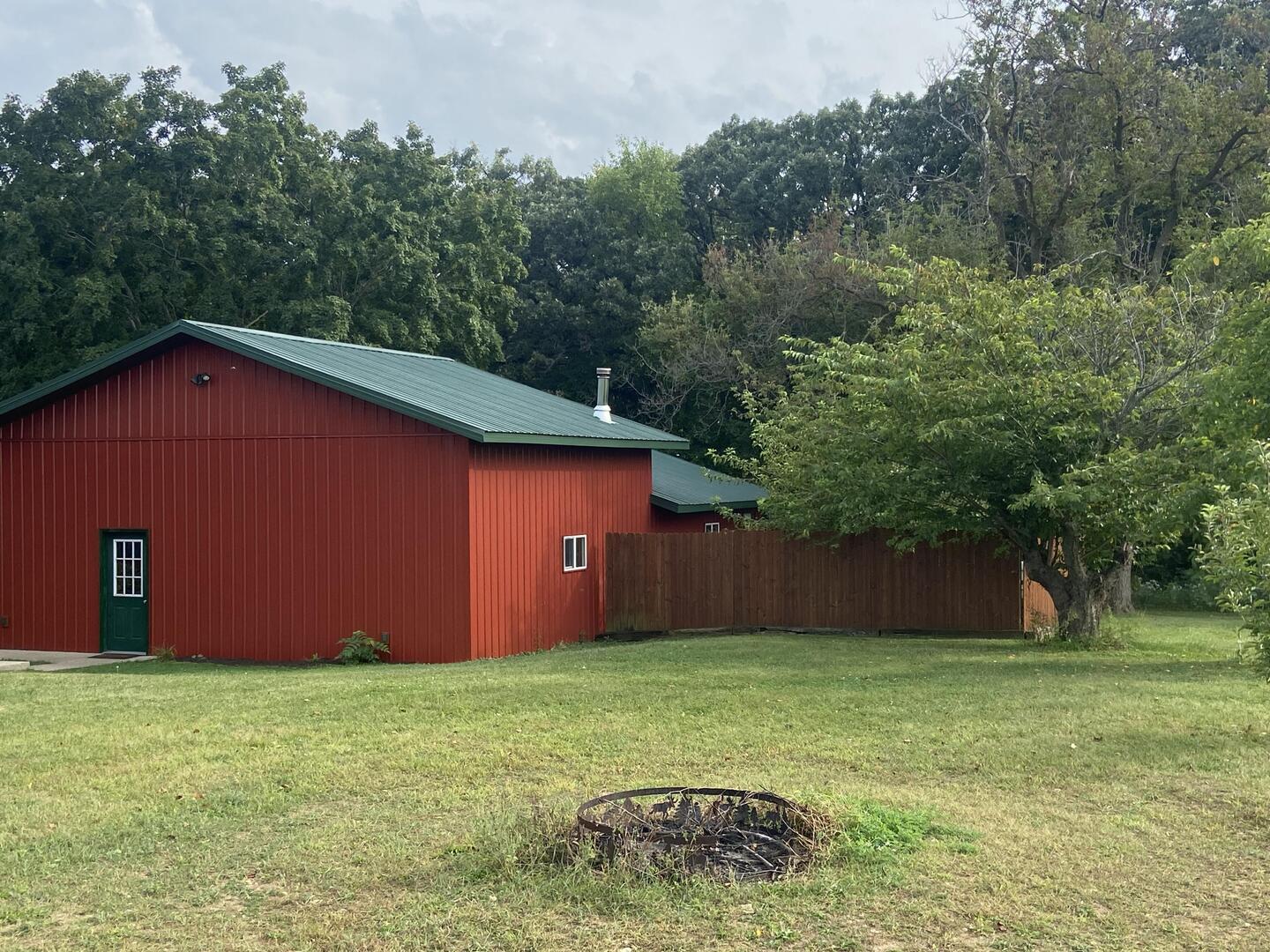 7330 North Crestview Road Stillman Valley, IL 61084 - Photo 4 of 33 a backyard of a house with lots of green space
