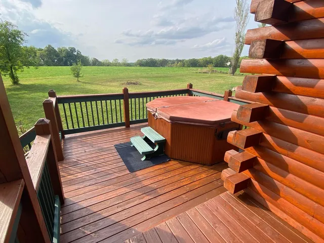 a view of swimming pool with lounge chair