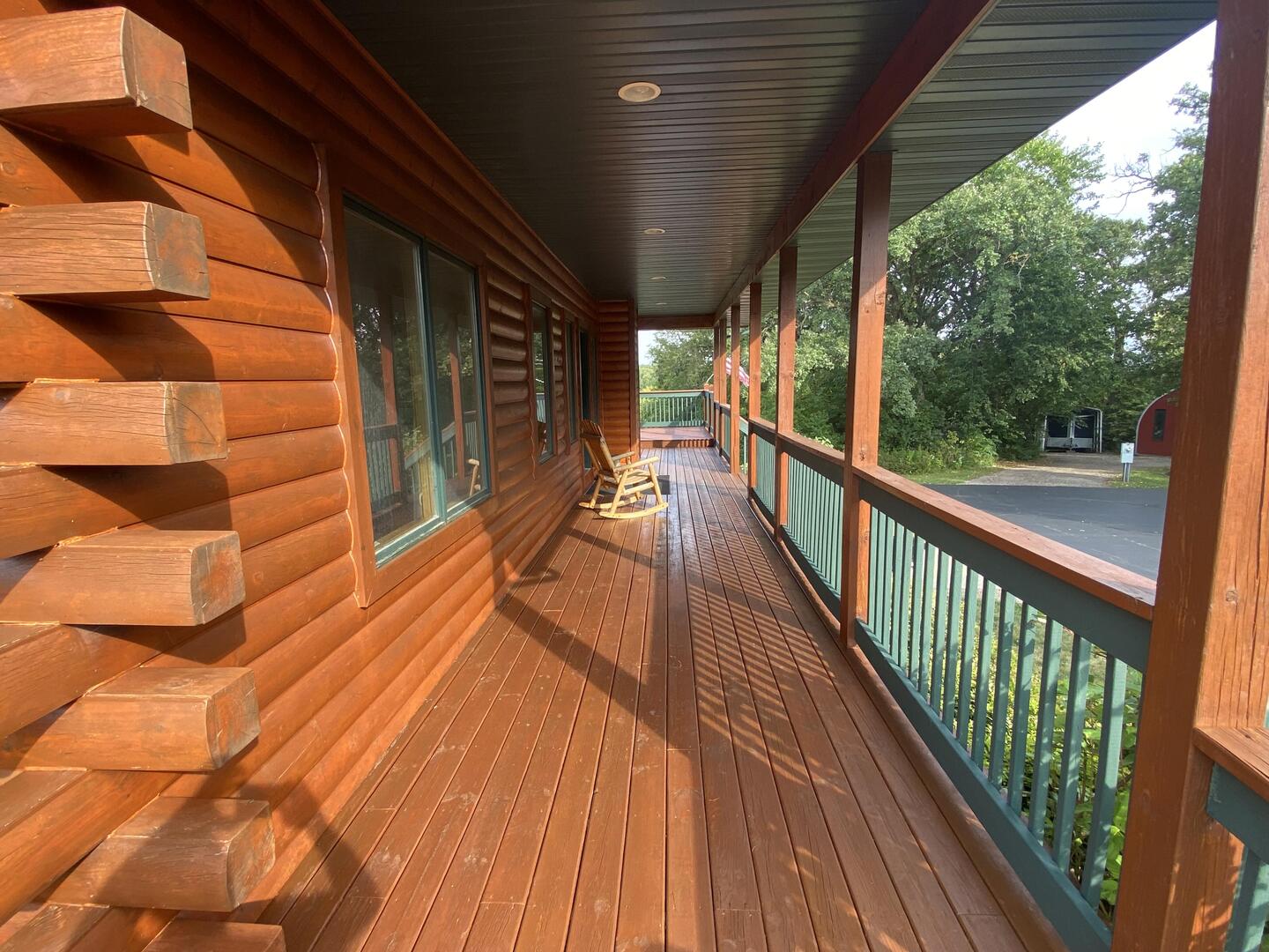 7330 North Crestview Road Stillman Valley, IL 61084 - Photo 6 of 33 a view of balcony with wooden floor