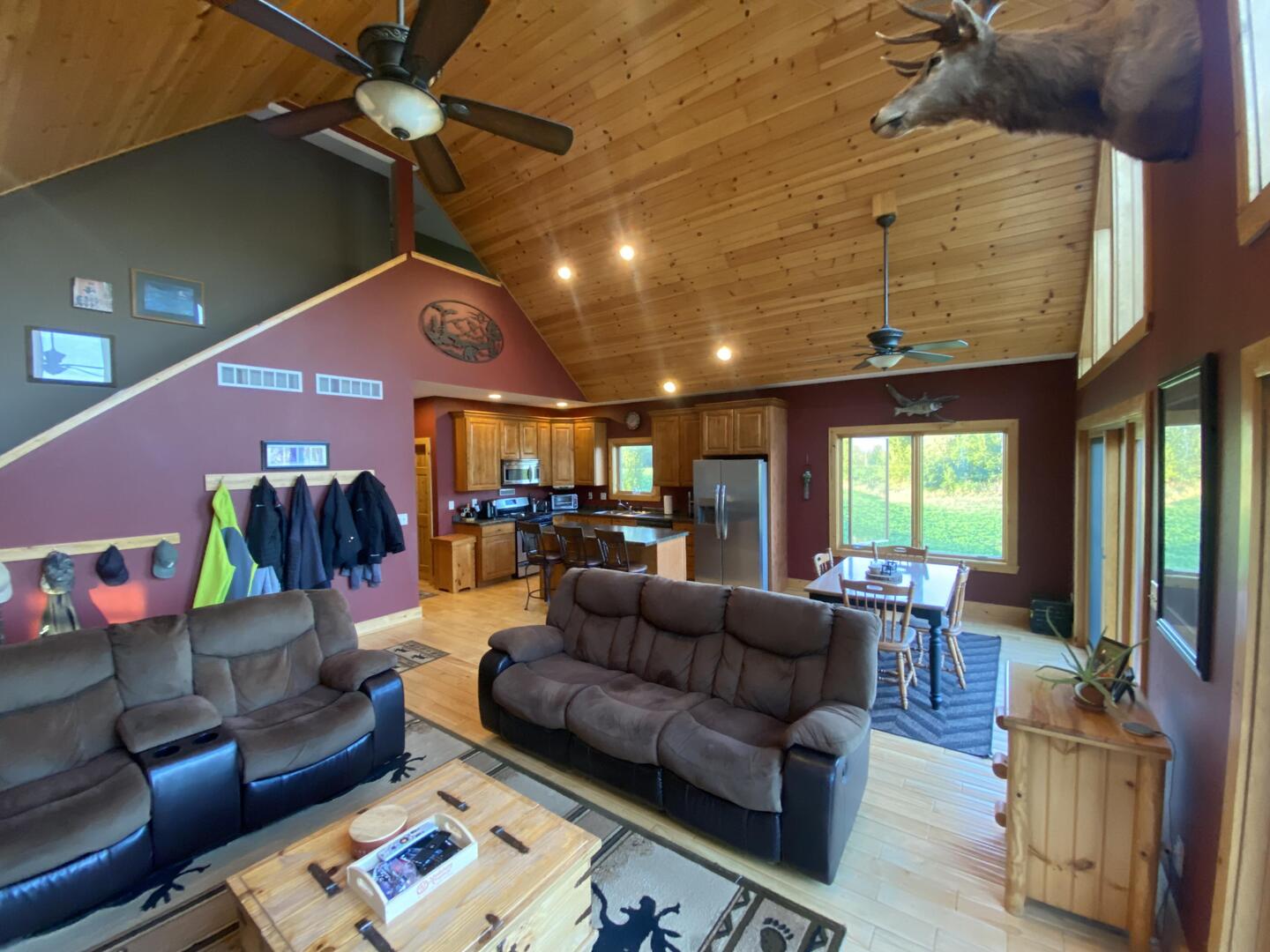 7330 North Crestview Road Stillman Valley, IL 61084 - Photo 7 of 33 a living room with furniture and a flat screen tv