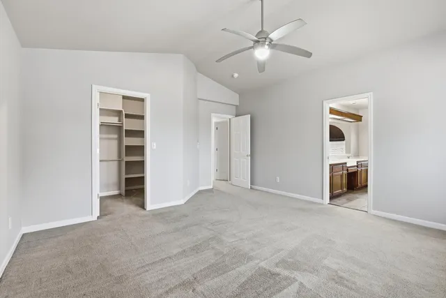 a view of an empty walk in closet
