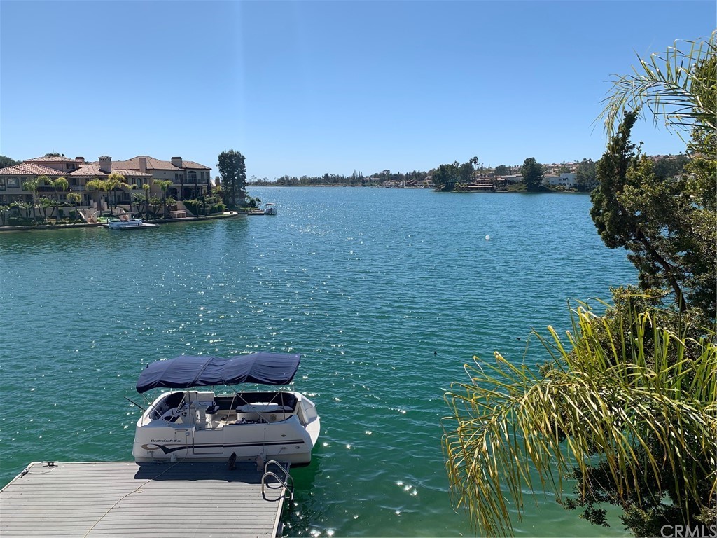 a car parked on the side of a lake