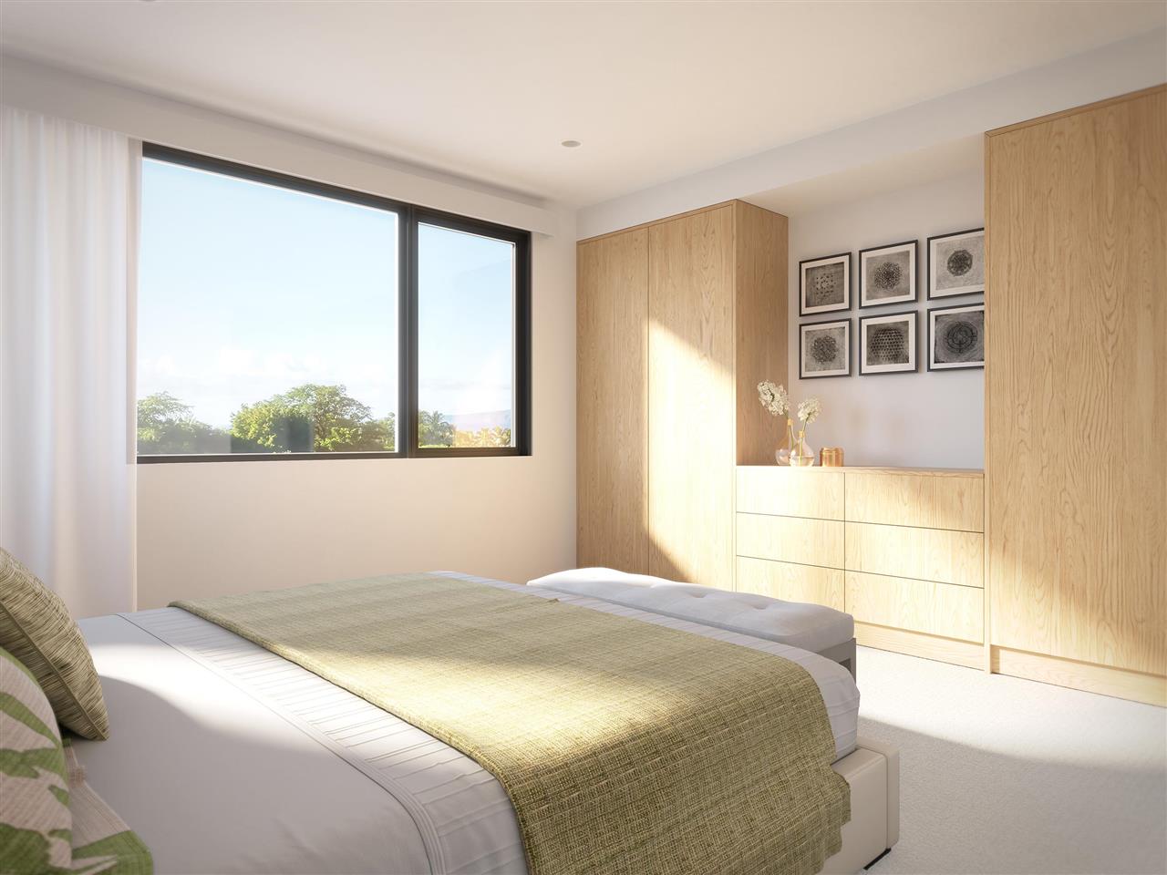 78 Kai Malu Drive, Unit 102 Kihei, HI 96753 - Photo 7 of 8 a bedroom with a large bed and a window