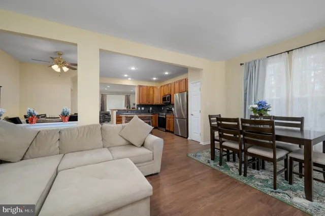 a bathroom with a sink toilet and mirror
