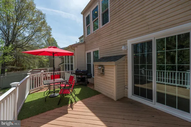 a view of balcony with wooden floor
