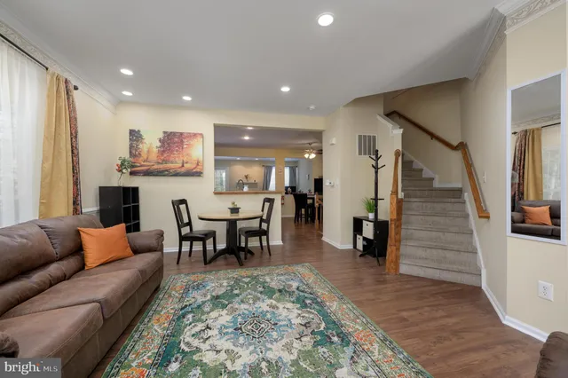 a living room with furniture and a couch