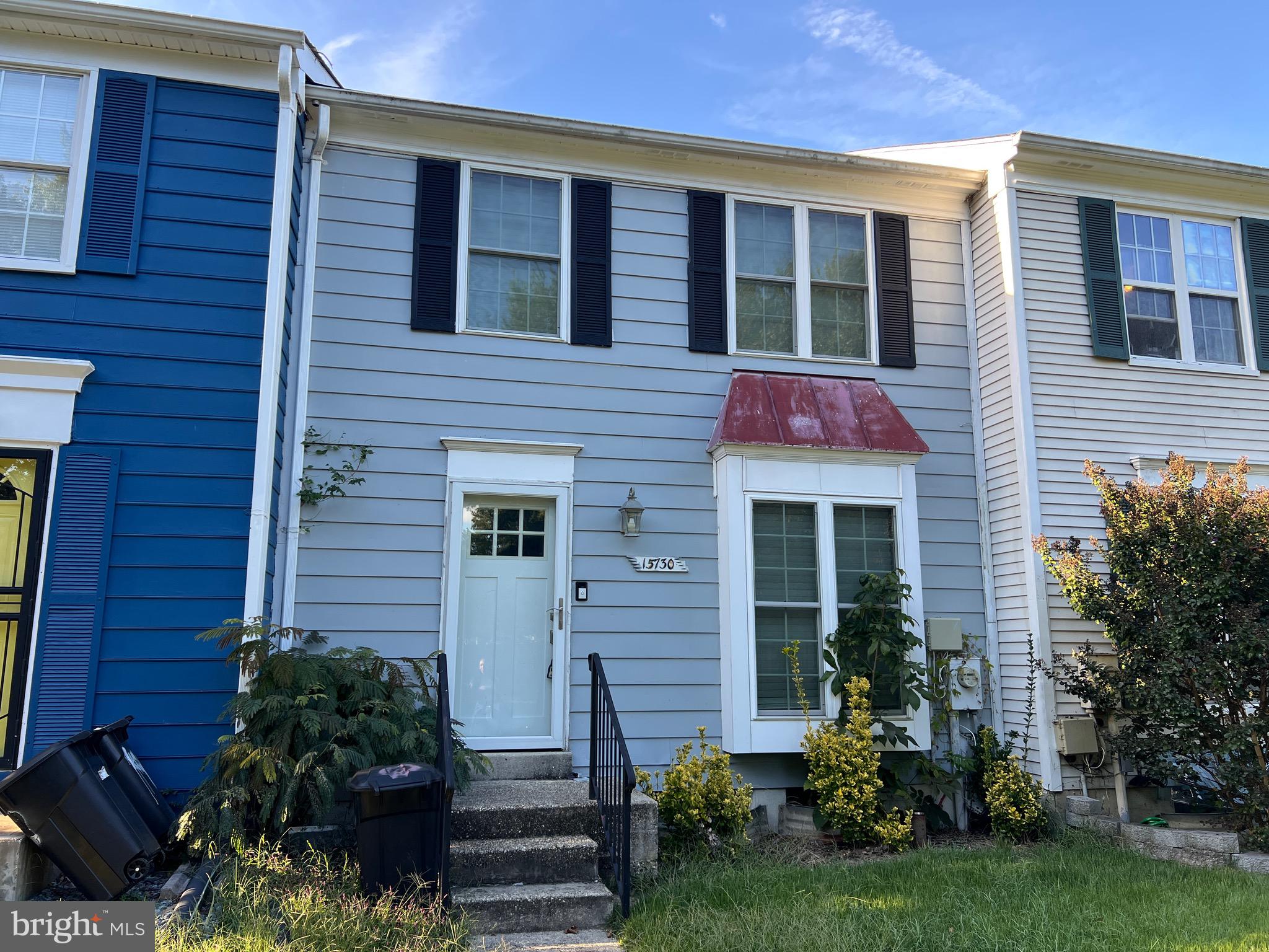 15730 Piller Lane Bowie, MD 20716 - Photo 1 of 1 a view of a house with potted plants and a yard