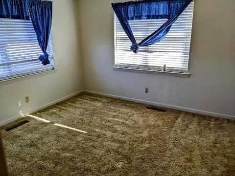 an empty room with a window