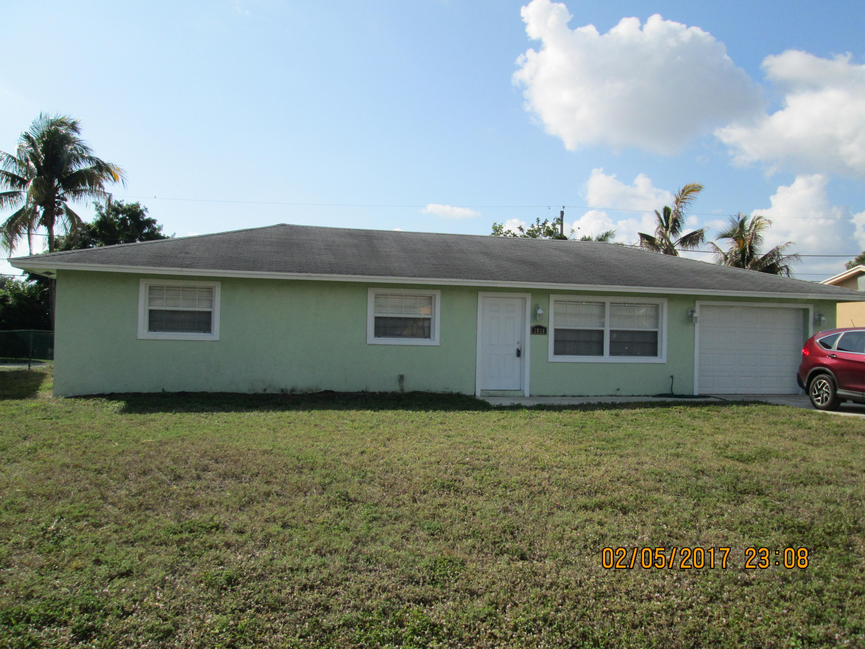 2856 Worcester Road Lake Worth, FL 33462 - Photo 2 of 20 Front Exterior
