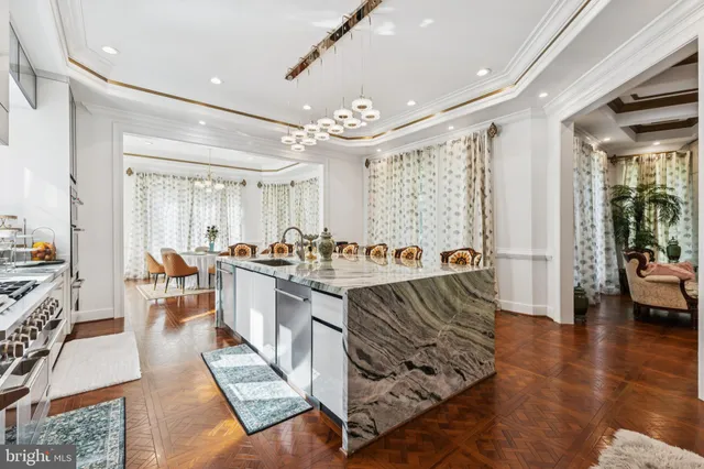 a dinning area with pool table and chairs