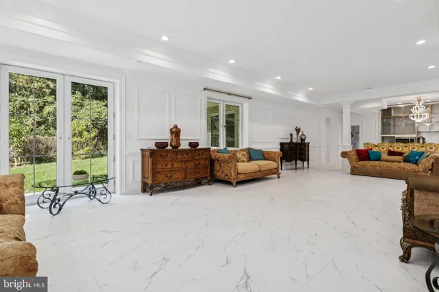 a kitchen with granite countertop a sink and a stove