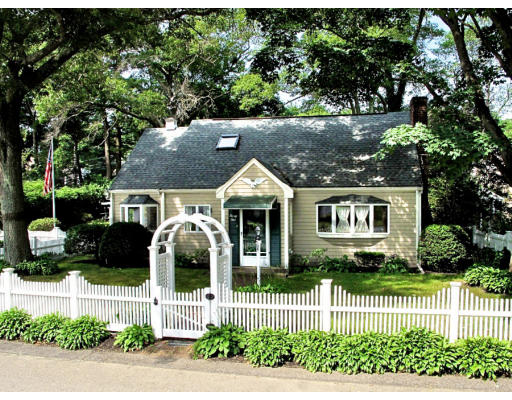 24 Wilder Road Norwell, MA 02061 - Photo 1 of 1 a front view of a house with a garden