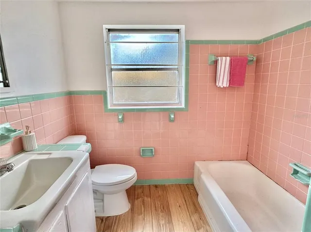 a bathroom with a sink and a bathtub