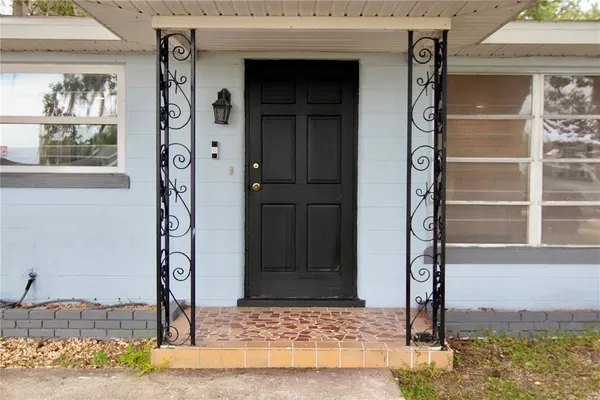 a front view of a house with a porch