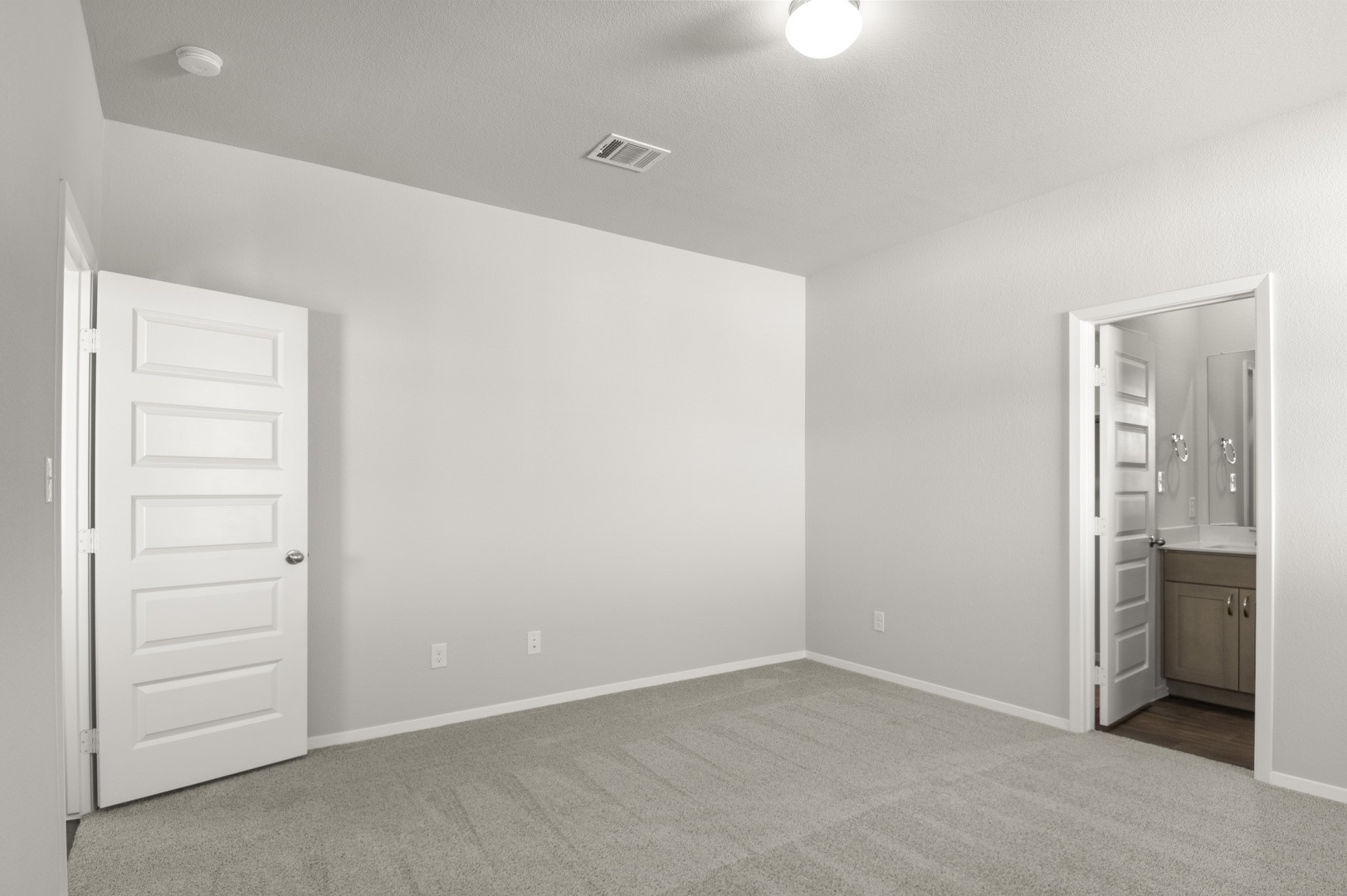 149 Daylily Drive Elgin, TX 78621 - Photo 23 of 31 an empty room with closet and mirrors