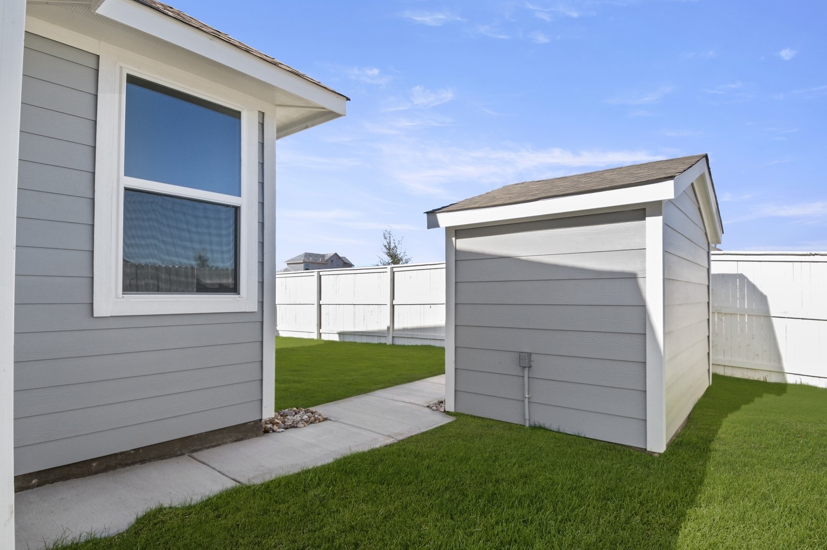 149 Daylily Drive Elgin, TX 78621 - Photo 29 of 31 a view of a back yard of the house
