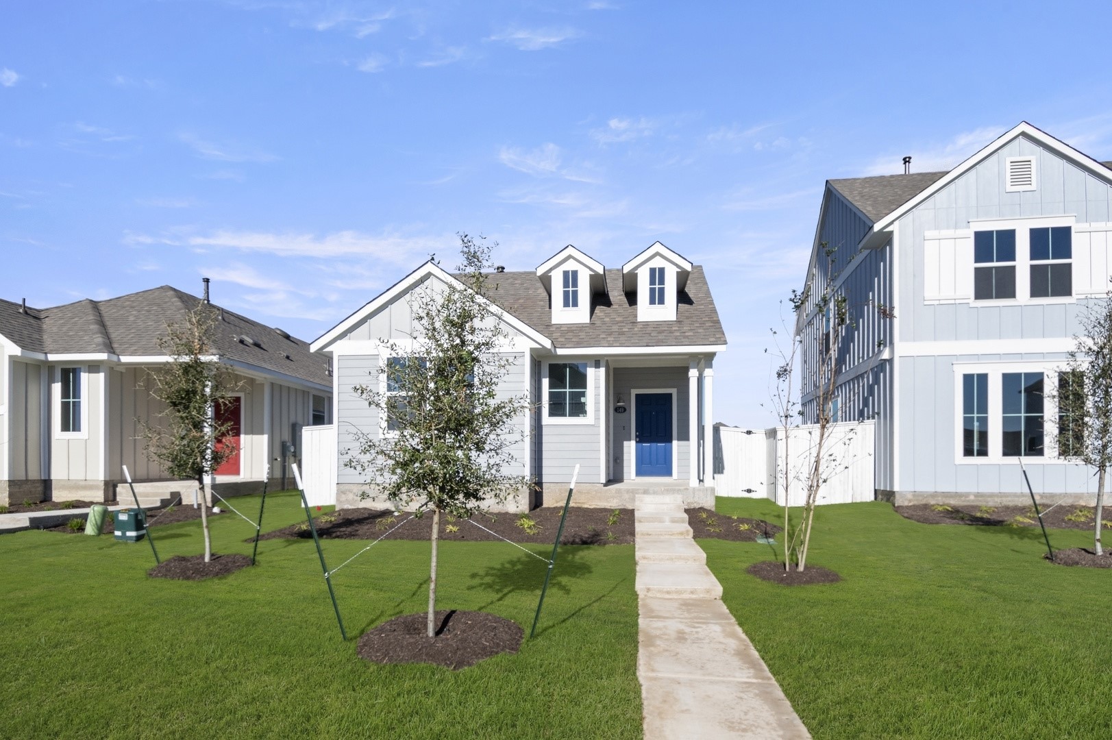 149 Daylily Drive Elgin, TX 78621 - Photo 4 of 31 a front view of house with yard and green space