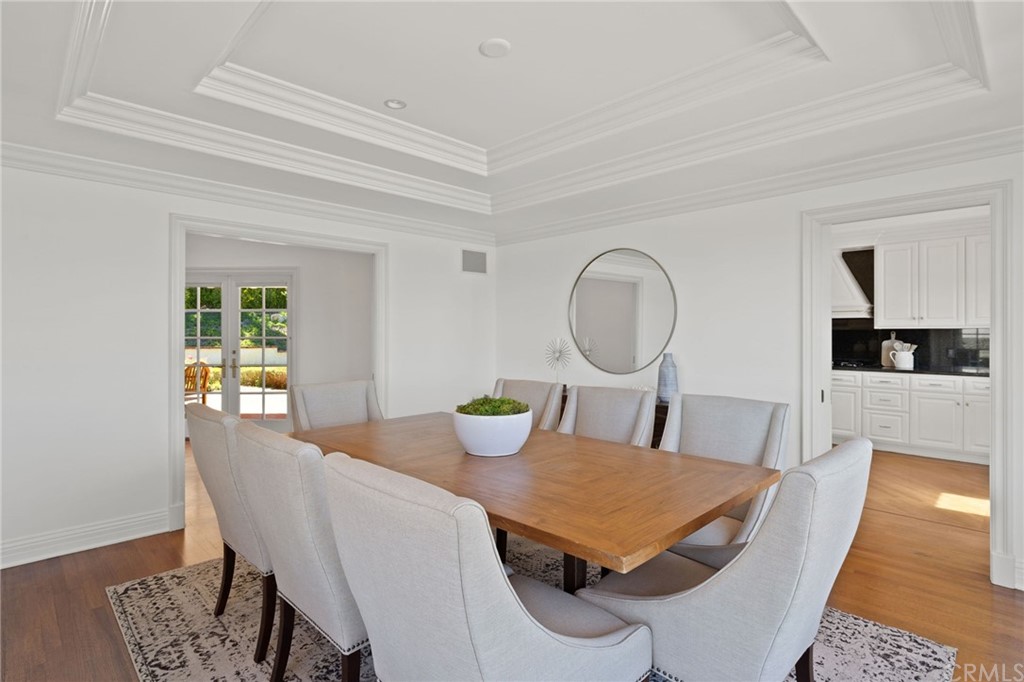 1300 Granvia Altamira Palos Verdes Estates, CA 90274 - Photo 20 of 60 a view of a dining room with furniture and wooden floor
