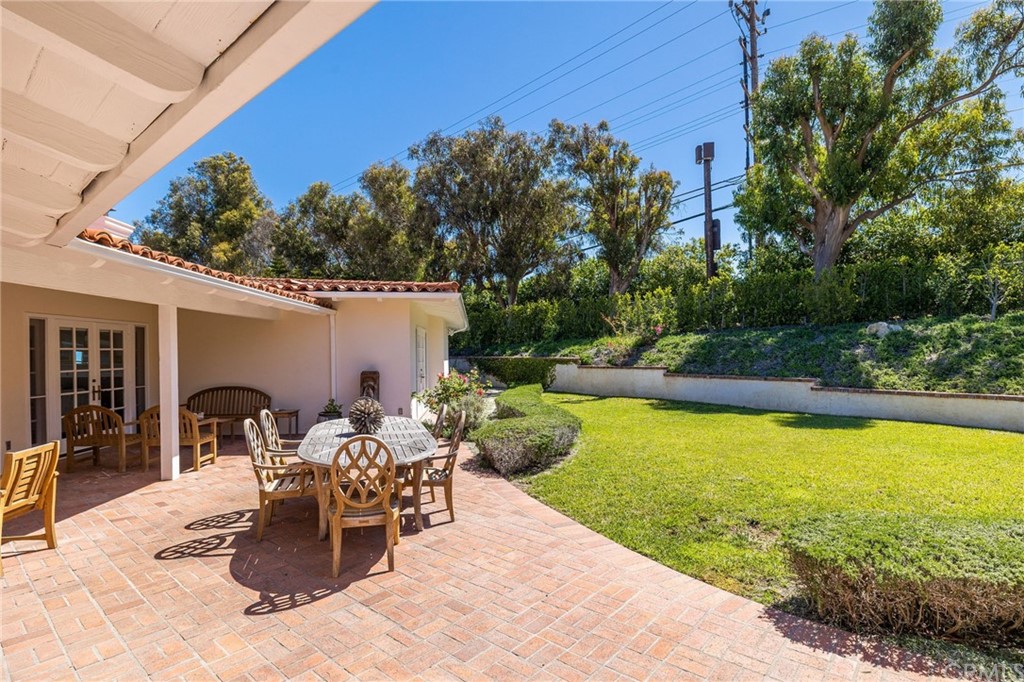 1300 Granvia Altamira Palos Verdes Estates, CA 90274 - Photo 48 of 60 a view of a swimming pool with chair and tables